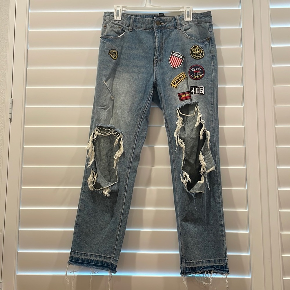 Ripped and Patched Denim Jeans